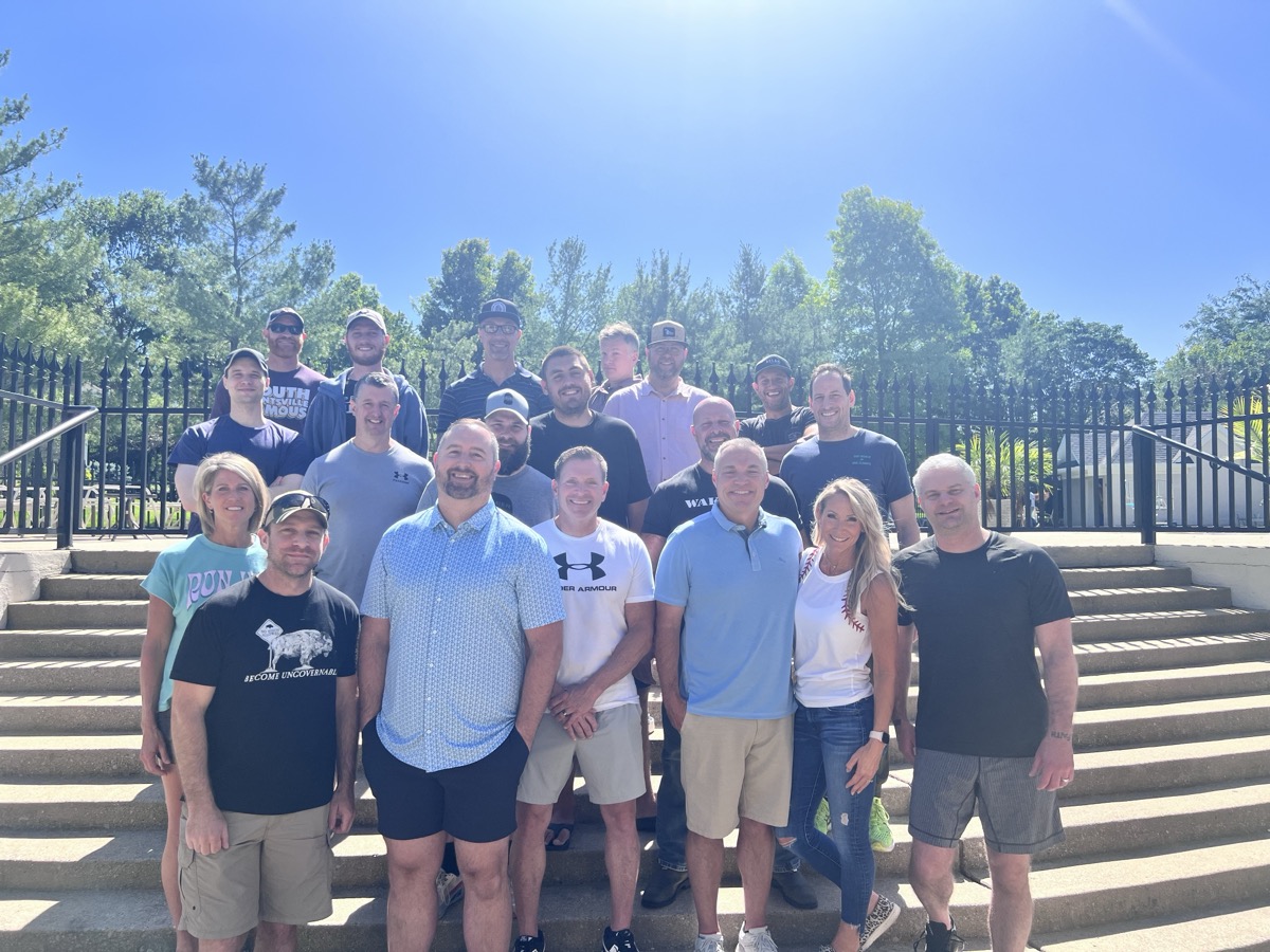 Mastermind group on steps — 2024